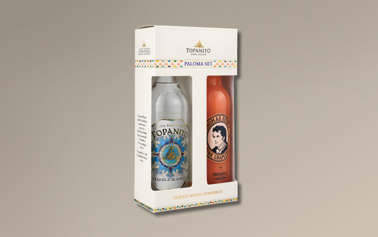Topanito Paloma Set firmy Perola łączy Blanco Tequila i Thomas Henry Pink Grapefruit w opakowaniu ozdobnym opracowanym przez Karl Knauer. Dwa duże okienka eksponują butelki. © Perola